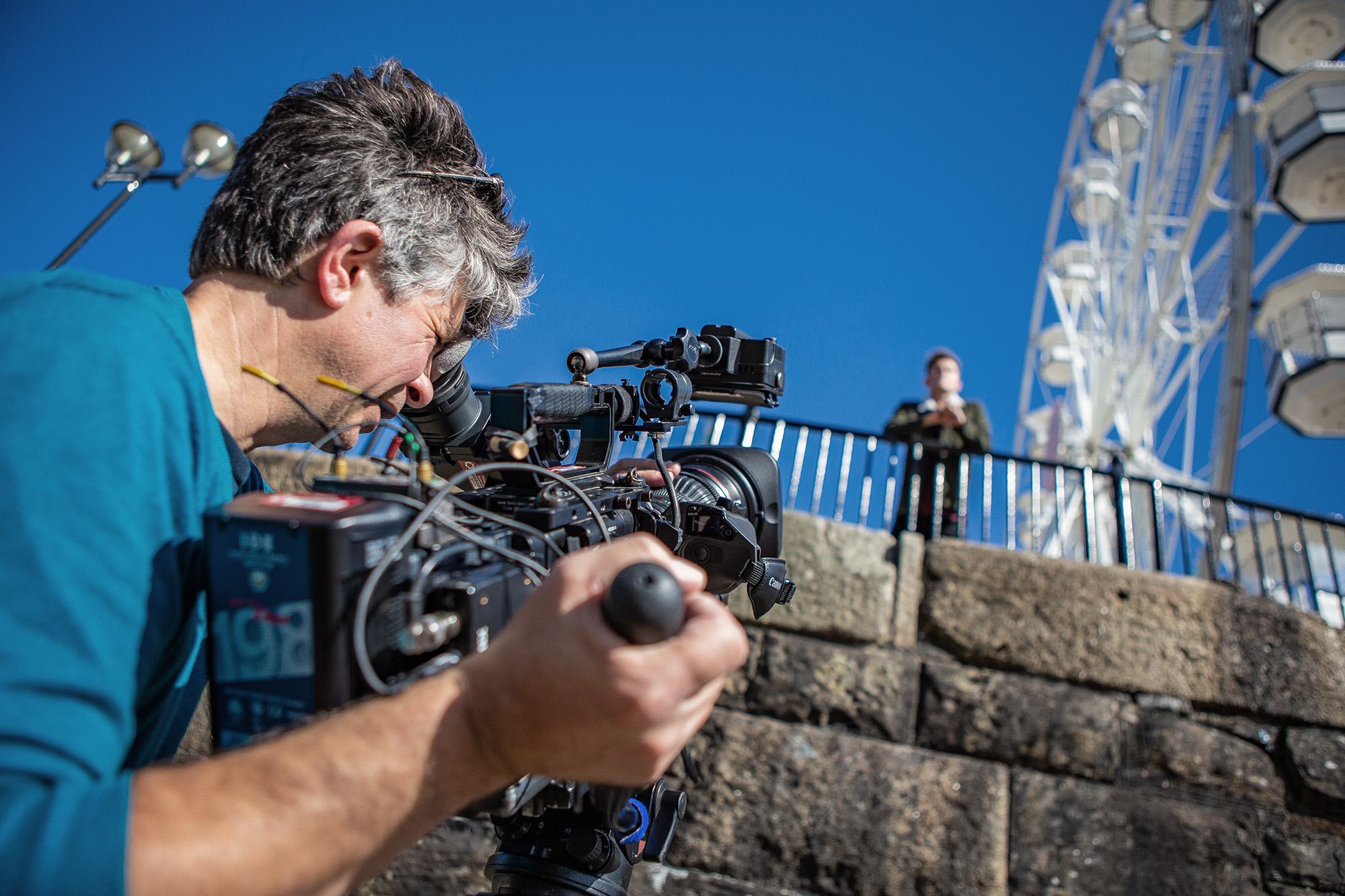 Cameraman Giles Edwards filming an explainer video