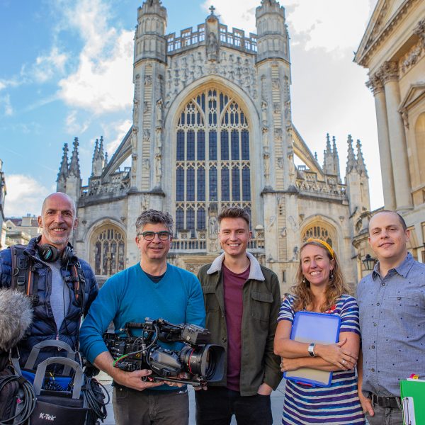 Octopus Films team posing in front of Bath Cathedral