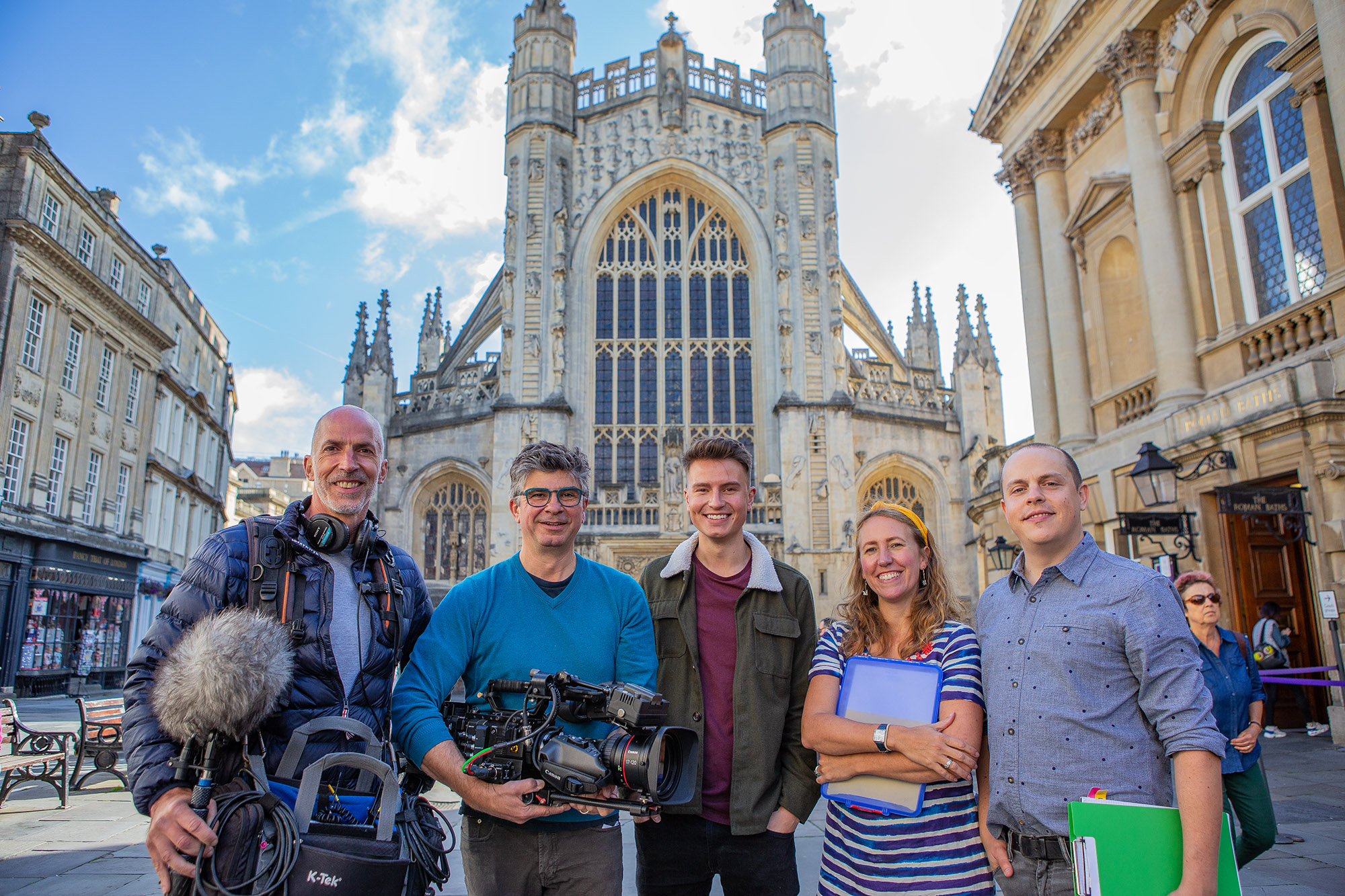 Octopus Films team posing in front of Bath Cathedral