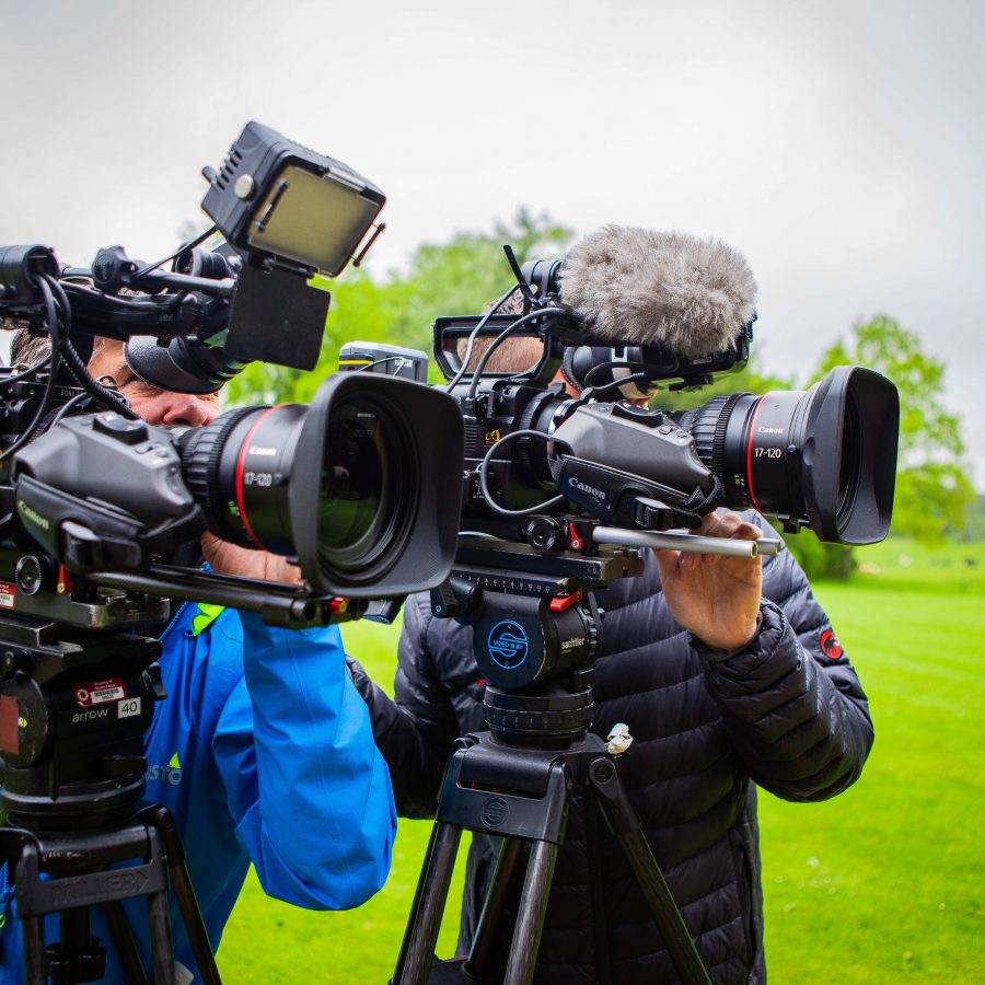 Two camera operators working for a sustainable video company