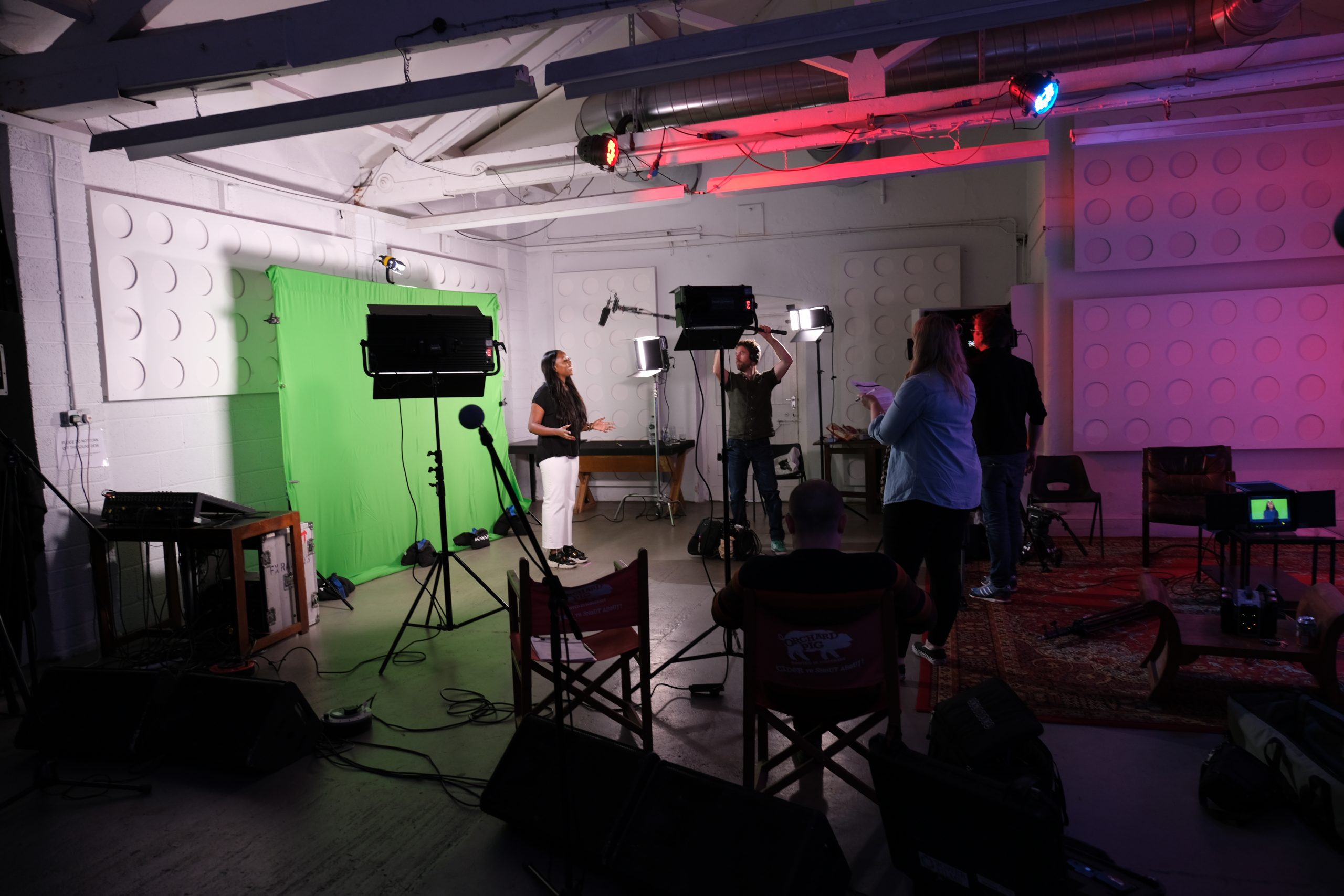 Behind the scenes at a green screen video shoot